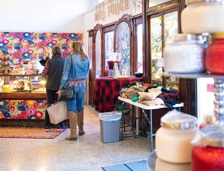 Two women shopping at a boutique in St. Joseph, Mo (credit: St. Joseph Chamber of Commerce).