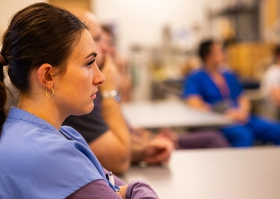 A medical student looks on during a lesson.