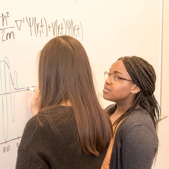 Students from the STAHR Scholars program having a fun conversation in class.