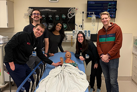 Emergency Medicine residents treating a child in the Simulation Lab.