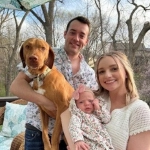 Portrait of Riley Hedberg with his wife, daughter and dog.