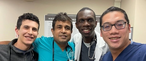 Four IM residents smiling.