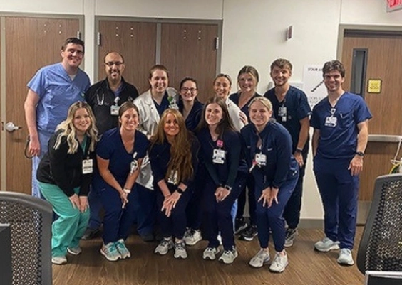 Group photo of critical care fellows and faculty.