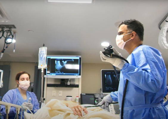 A UMKC faculty member and fellow perform a surgical procedure.