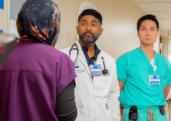 An internal medicine resident studies at a hospital desk.