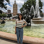 Simran standing in front of the Nichols fountainn