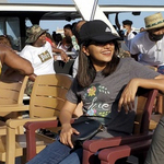 Roshni sitting outside at an outdoor event