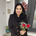 Laraib holding a bouquet of flowers