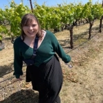 Portrait of Allyson Rowe, OBGYN resident, in a vinyard.