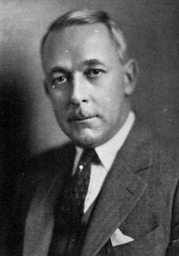 Portrait of Dr. Franklin D. Dickson dressed in a suit and tie.