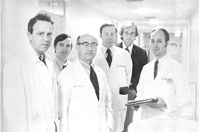 Dr. Meyer, a founding member of our department, leads orthopaedic team rounds through the hospital in 1971.