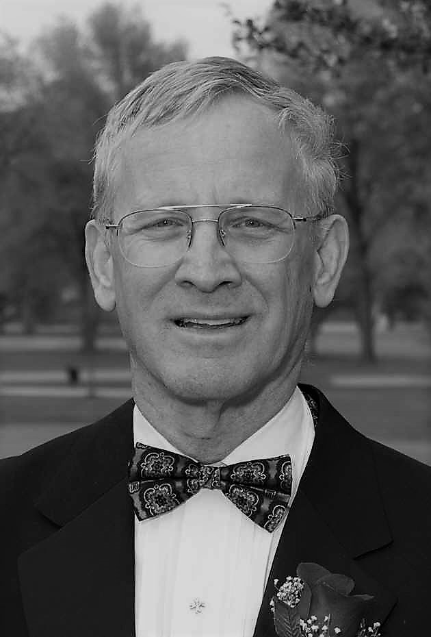 Portrait of James J. Hamilton dressed in suite and bowtie.