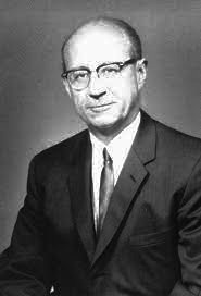 Portrait of Dr. Paul W. Meyer dressed in a suit and tie.