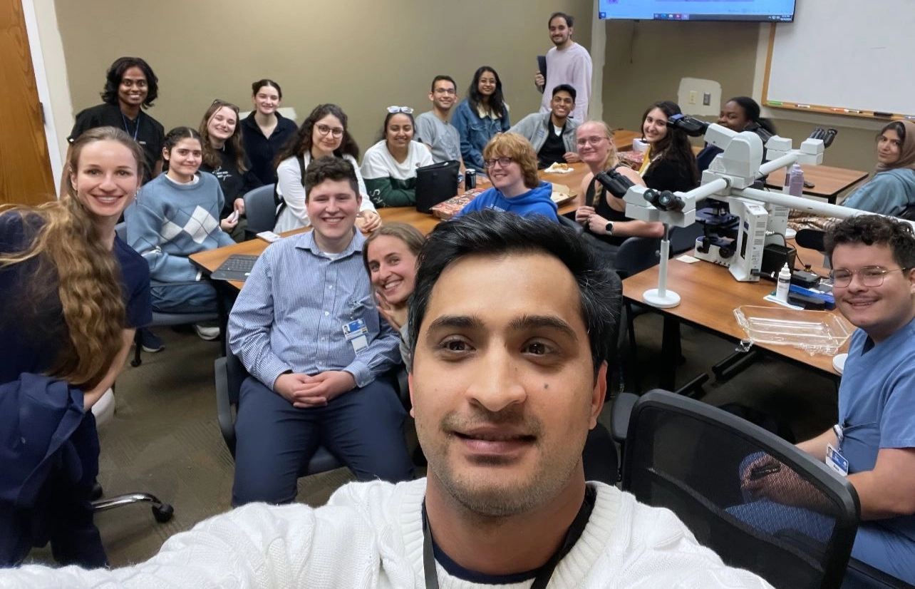 Pathology Interest Group students take a group selfie in the lab.