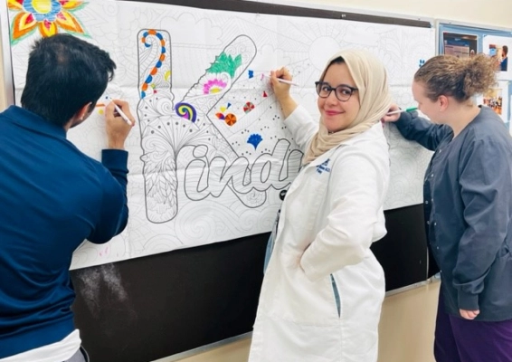 Three pathology residents posing for a photo.