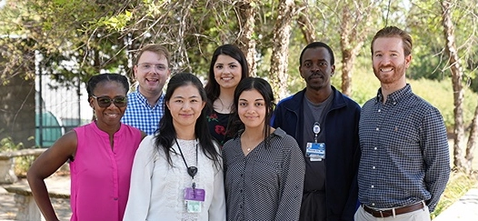 Small group of psychiatry residents posing for a photo.