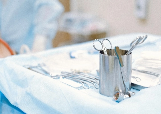 Surgical table with handheld tools