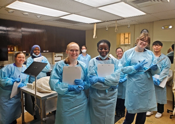 Rural Pathway Program students posing for a casual photo in one of the operating rooms.